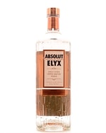 Stor Absolut Elyx flaske i klart glas med kobberfarvet kapsel til bardisken