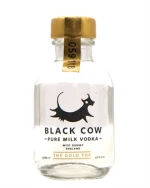 Black Cow miniatureflaske med sort etiket og hvidt komotiv