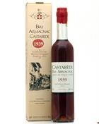 Flaske Castarède 1939 årgangsarmagnac med bagetiket og mørk væske