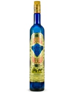 Søjleformet flaske Corralejo Tequila Reposado med lys gylden væske og farverig etiket