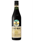 Stor magnumflaske Fernet Branca med sort etiket og gylden ørn