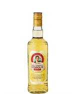 Gylden akvavitflaske med klassisk etiket i mildere stil