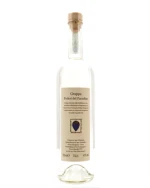 Flaske Grappa Poderi del Paradiso med lys gylden farve