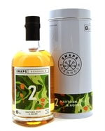 Flaske med havtorn-akvavit i lys grøn og orange etiket