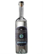 Flaske Topanito Mezcal Madre Cuishe Blanco med klar, farveløs væske