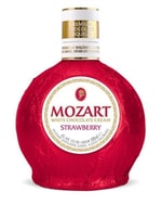 Rund Mozart flaske i lyserød folie med jordbærrosa likør