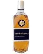 The Antiquary De Luxe Old Scotch Whisky gammel udgave flaske